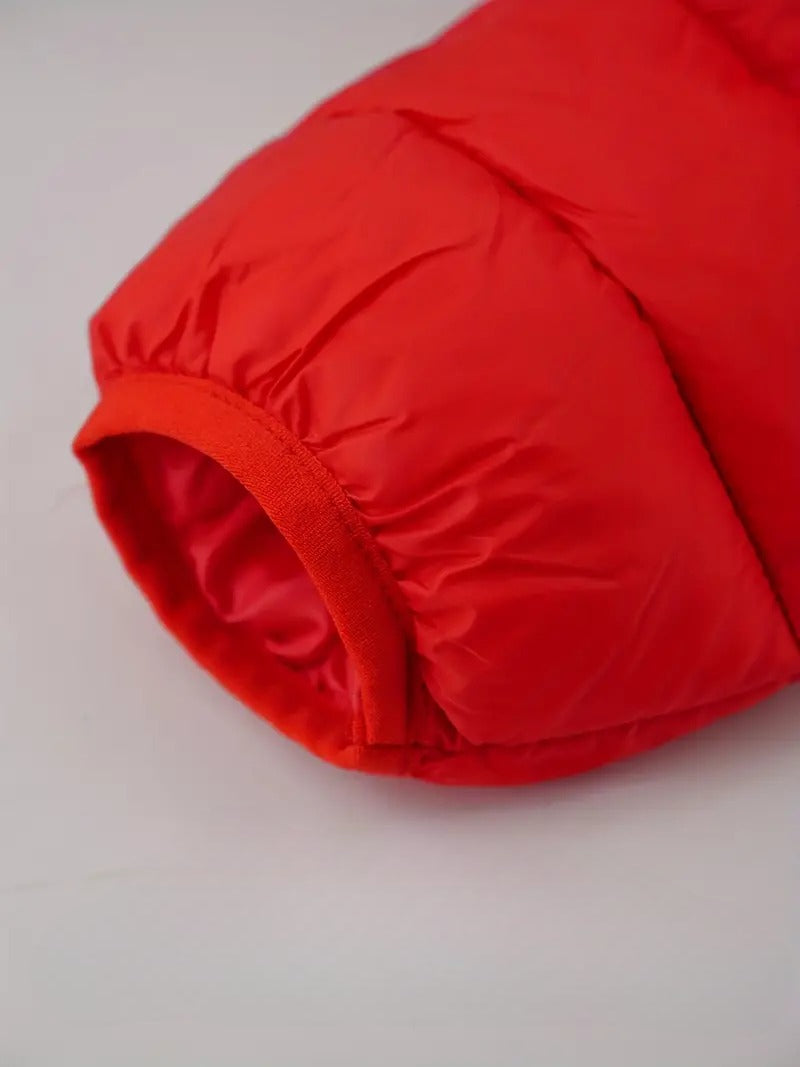 Red winter down jacket sleeve showing high-quality insulation and stylish design.